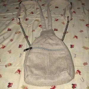 4/$10🌻🌻Cute tan mini backpack purse with sparkles